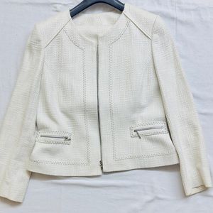 Woman’s zippered suit lightly worn